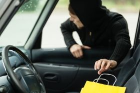 Man stealing a shopping bag - Nevada shoplifting laws